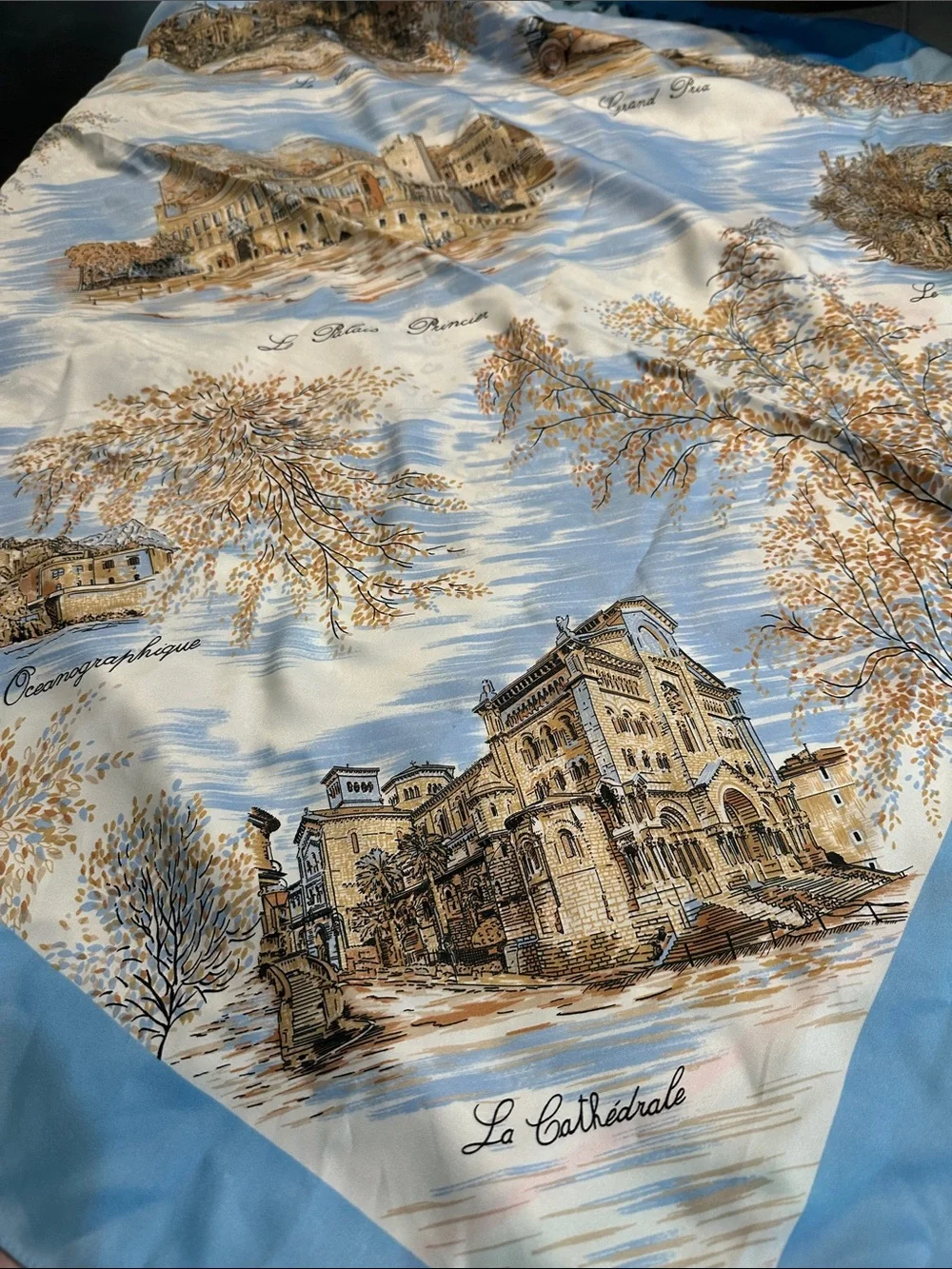 Assorted vintage souvenir scarves from Europe